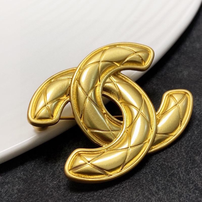 Ch**el brooches